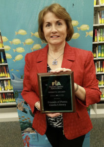 Kadie Mazzi with FL Library Association award, 2015